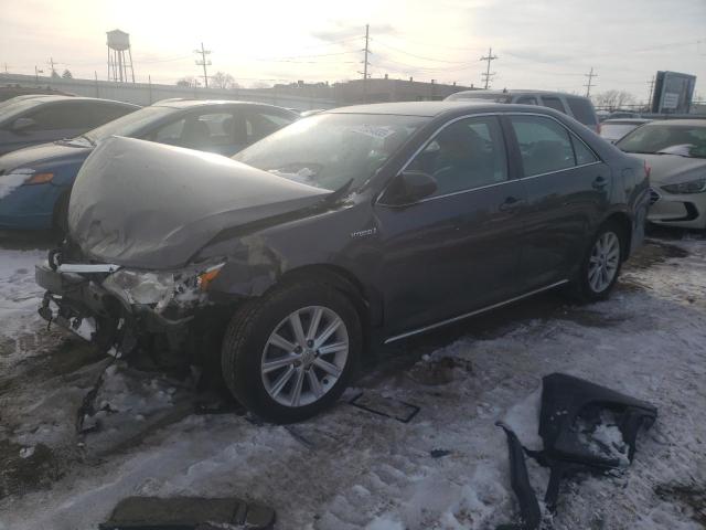 TOYOTA CAMRY HYBR 2014 with VIN 4T1BD1FK9EU107796 - Photo from auction