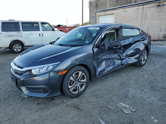 HONDA CIVIC LX 2017 with VIN 2HGFC2F59HH573522 - Photo from auction