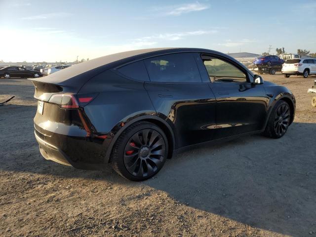 Photo 3 from auction – 2022 TESLA MODEL Y with VIN 7SAYGDEF4NF520491