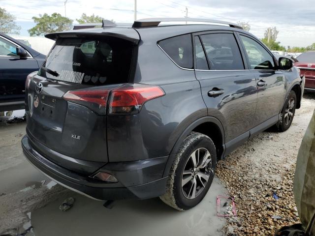 Photo 3 from auction – 2017 TOYOTA RAV4 XLE with VIN JTMWFREV2HD103183