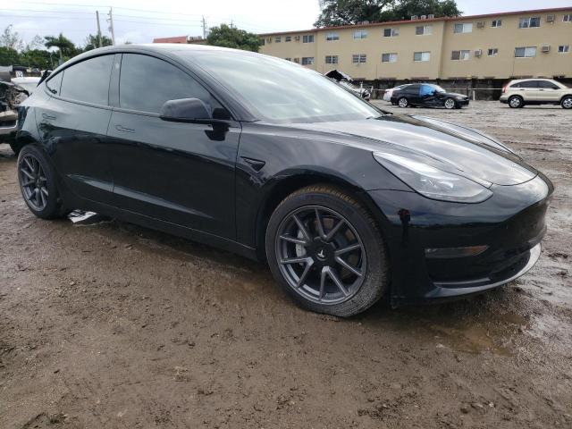 Photo 4 from auction – 2022 TESLA MODEL 3 with VIN 5YJ3E1EBXNF103627