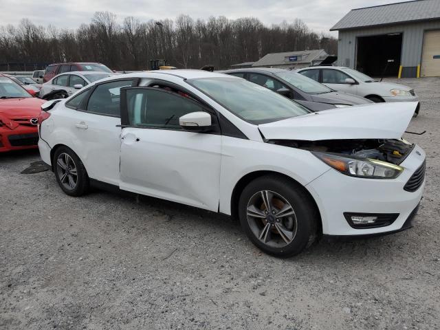 Photo 4 from auction – 2017 FORD FOCUS SE with VIN 1FADP3FE3HL311634