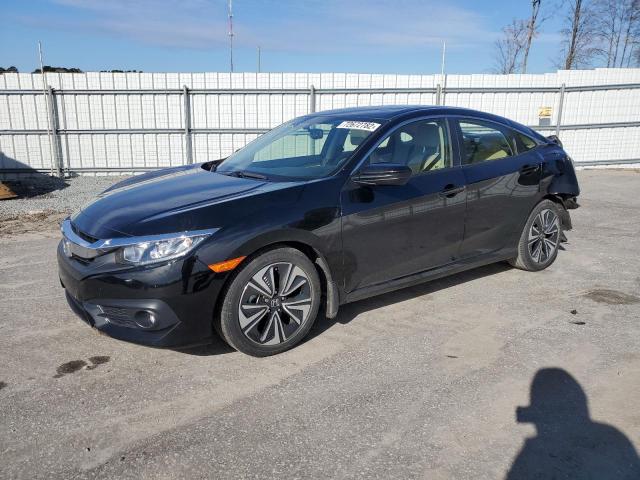 HONDA CIVIC EXL 2018 with VIN JHMFC1F75JX038682 - Photo from auction