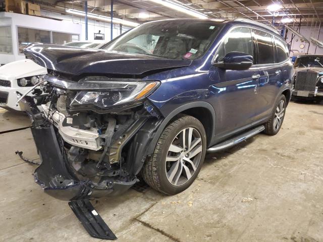 HONDA PILOT ELIT 2018 with VIN 5FNYF6H07JB023268 - Photo from auction