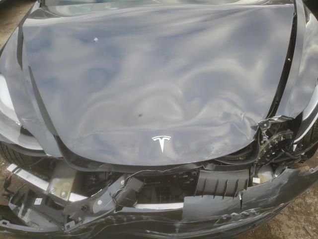 Photo 11 from auction – 2022 TESLA MODEL 3 with VIN 5YJ3E1EB7NF184666