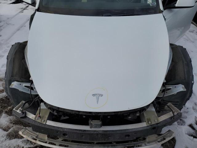 Photo 11 from auction – 2021 TESLA MODEL Y with VIN 5YJYGDEE4MF068528