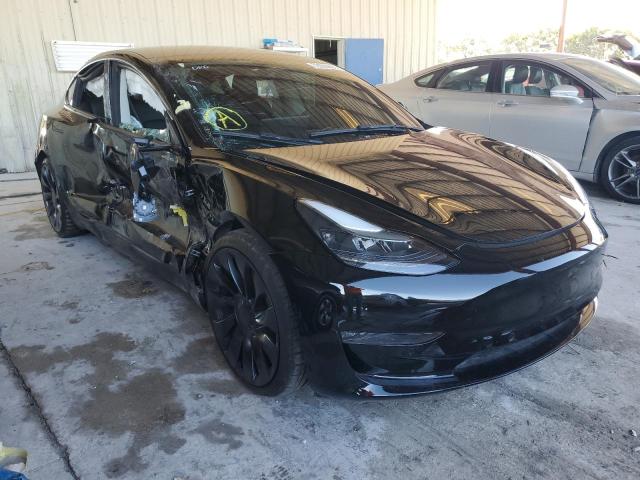 Photo 4 from auction – 2022 TESLA MODEL 3 with VIN 5YJ3E1EC0NF182525