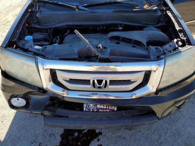 Photo 12 from auction – 2011 HONDA PILOT TOUR with VIN 5FNYF4H95BB084817