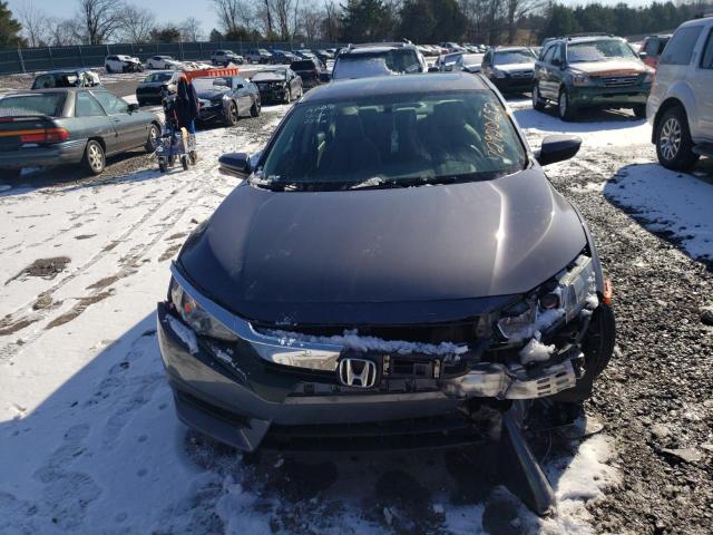 Photo 5 from auction – 2018 HONDA CIVIC EX with VIN 2HGFC2F70JH580429