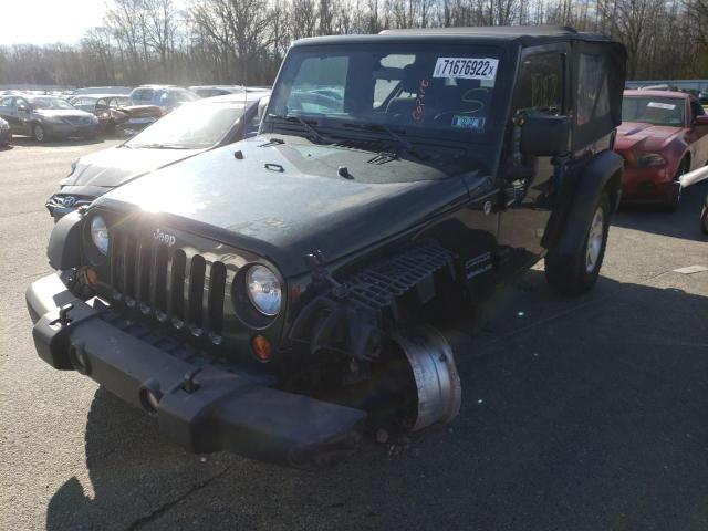 JEEP WRANGLER S 2011 with VIN 1J4AA2D10BL528858 - Photo from auction