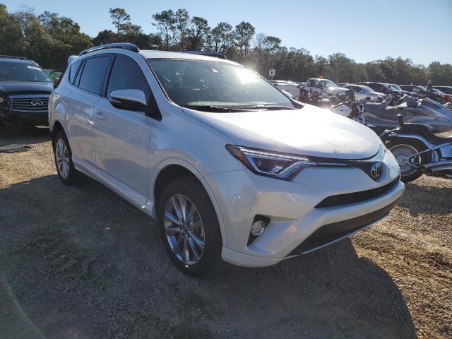 Photo 4 from auction – 2018 TOYOTA RAV4 LIMIT with VIN 2T3YFREV5JW429772