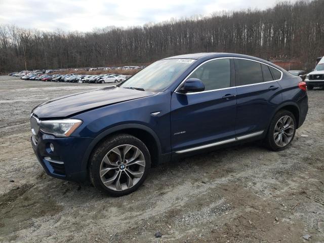 BMW X4 XDRIVE2 2018 with VIN 5UXXW3C58J0T80663 - Photo from auction