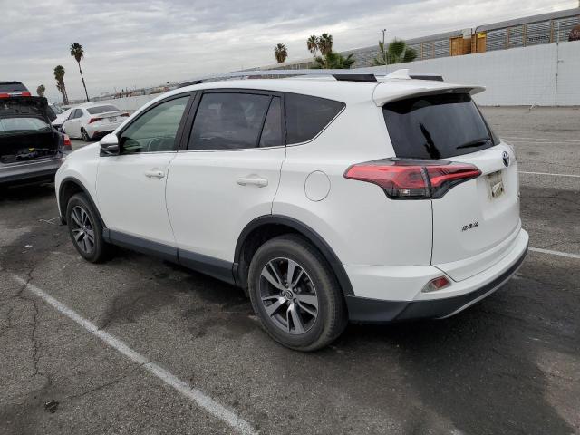 Photo 2 from auction – 2017 TOYOTA RAV4 XLE with VIN JTMWFREV5HJ117113