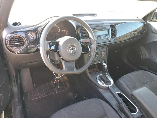 Photo 8 from auction – 2013 VOLKSWAGEN BEETLE with VIN 3VWFP7AT0DM690274