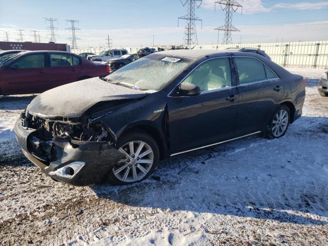 TOYOTA CAMRY HYBR 2012 with VIN 4T1BD1FK8CU019738 - Photo from auction