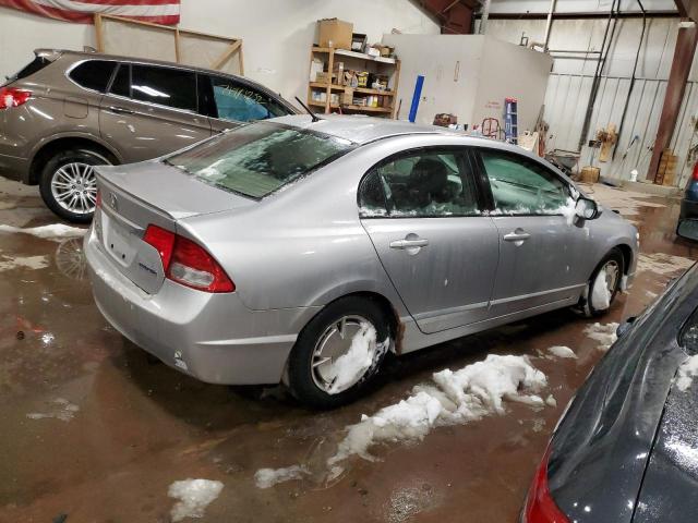 Photo 3 from auction – 2010 HONDA CIVIC HYBR with VIN JHMFA3F21AS003396