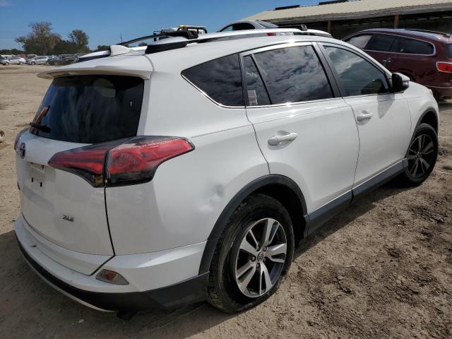 Photo 3 from auction – 2016 TOYOTA RAV4 XLE with VIN JTMWFREV4GJ079212