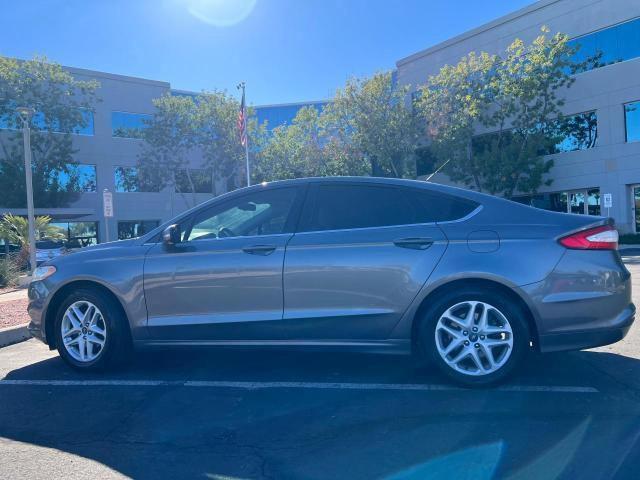 Photo 3 from auction – 2014 FORD FUSION SE with VIN 3FA6P0H73ER144159