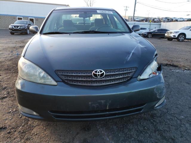 Photo 5 from auction – 2003 TOYOTA CAMRY with VIN JTDBF30K930112911
