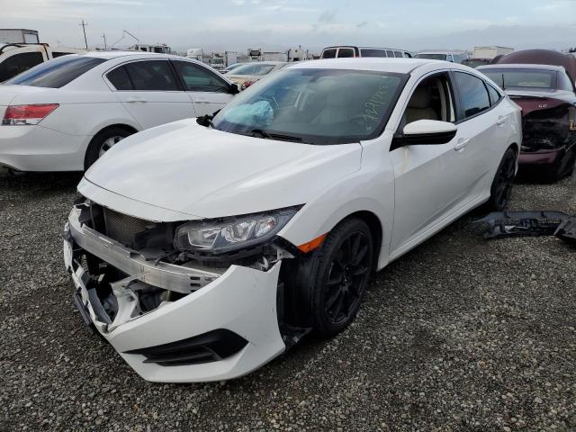 HONDA CIVIC LX 2018 with VIN 2HGFC2F57JH532926 - Photo from auction