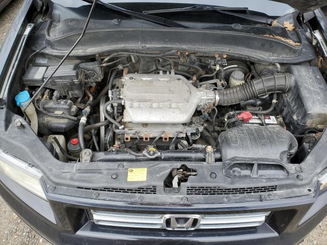 Photo 11 from auction – 2006 HONDA RIDGELINE with VIN 2HJYK16596H516296