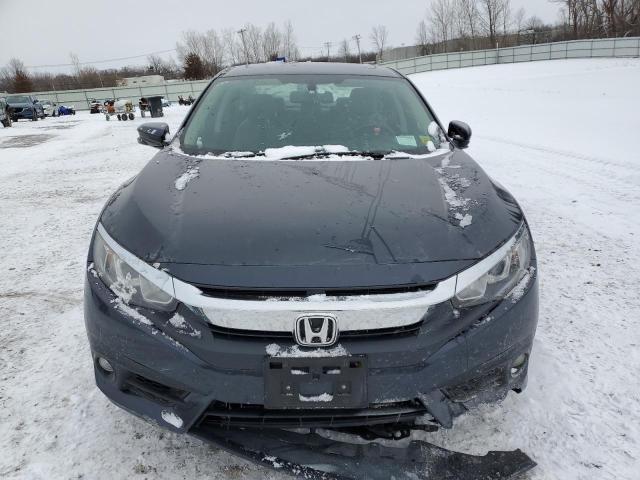 Photo 5 from auction – 2017 HONDA CIVIC EXL with VIN 2HGFC1F77HH642641