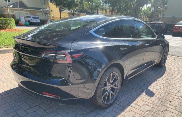 Photo 4 from auction – 2018 TESLA MODEL 3 with VIN 5YJ3E1EA2JF062668