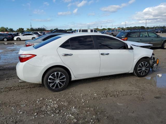 Photo 3 from auction – 2014 TOYOTA COROLLA L with VIN 5YFBURHE1EP052753