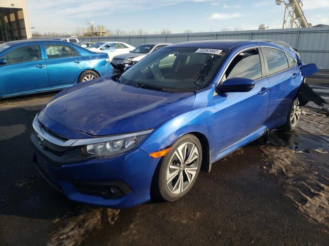 HONDA CIVIC EX 2018 with VIN JHMFC1F33JX038192 - Photo from auction