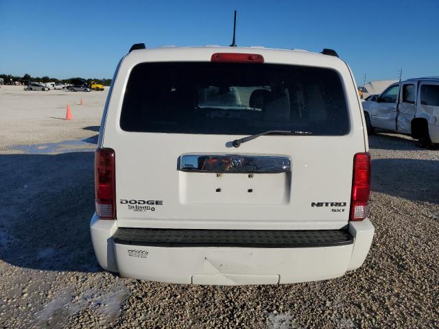 Photo 6 from auction – 2010 DODGE NITRO SXT with VIN 1D4PT5GK8AW111035