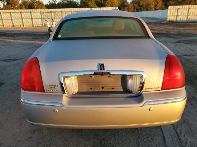 Photo 6 from auction – 2004 LINCOLN TOWN CAR E with VIN 1LNHM81W84Y680323