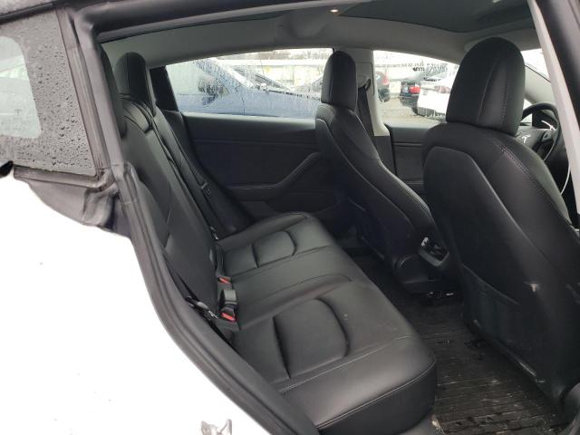 Photo 10 from auction – 2021 TESLA MODEL 3 with VIN 5YJ3E1EB1MF928177