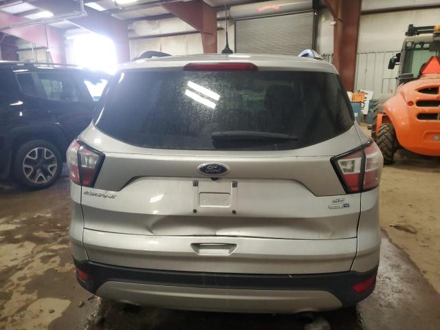 Photo 6 from auction – 2018 FORD ESCAPE SE with VIN 1FMCU9GD5JUD28535