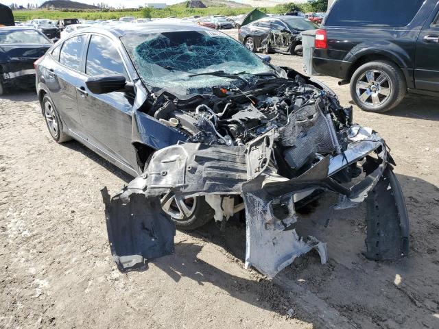 Photo 4 from auction – 2018 HONDA CIVIC LX with VIN 19XFC2F50JE009368