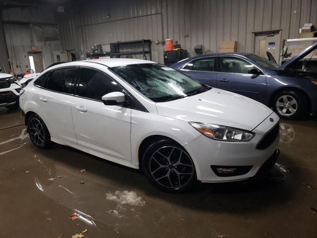 Photo 4 from auction – 2016 FORD FOCUS SE with VIN 1FADP3F21GL368449