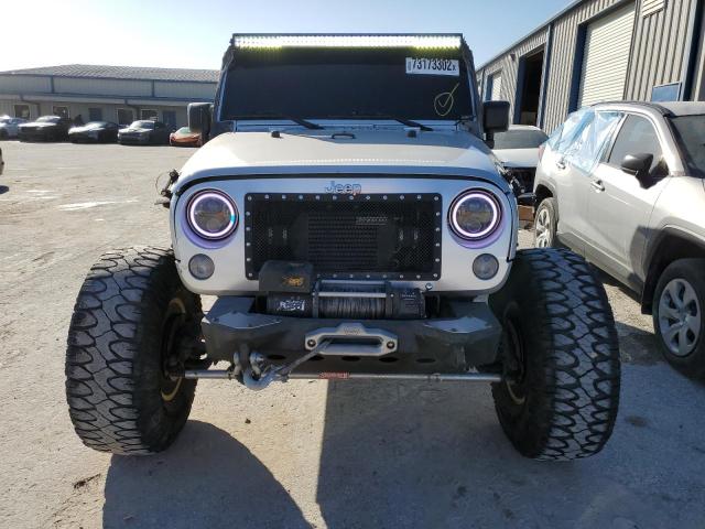 Photo 5 from auction – 2011 JEEP WRANGLER U with VIN 1J4BA3H15BL512630