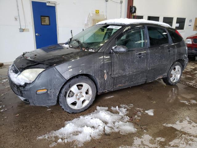 FORD FOCUS 2005 with VIN 3FAHP37NX5R111976 - Photo from auction