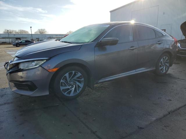 HONDA CIVIC EX 2017 with VIN 19XFC2F71HE230909 - Photo from auction