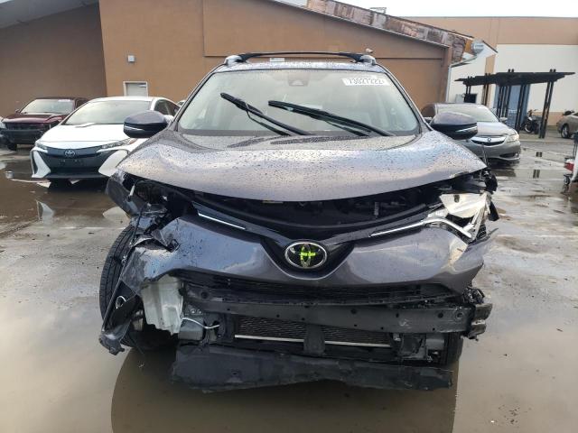 Photo 5 from auction – 2017 TOYOTA RAV4 XLE with VIN JTMRFREV5HJ125452