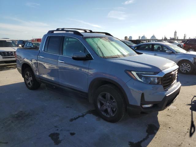 Photo 4 from auction – 2022 HONDA RIDGELINE with VIN 5FPYK3F79NB029418