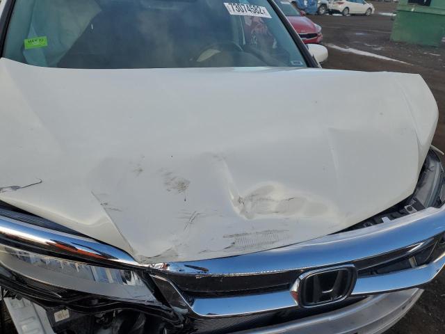 Photo 12 from auction – 2019 HONDA PILOT ELIT with VIN 5FNYF6H01KB083922