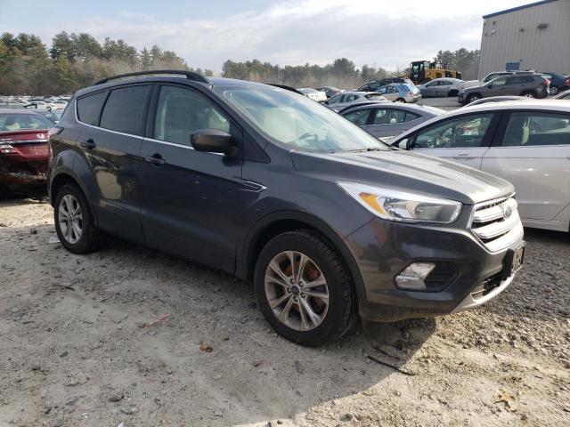 Photo 4 from auction – 2018 FORD ESCAPE SE with VIN 1FMCU9GD9JUC16093