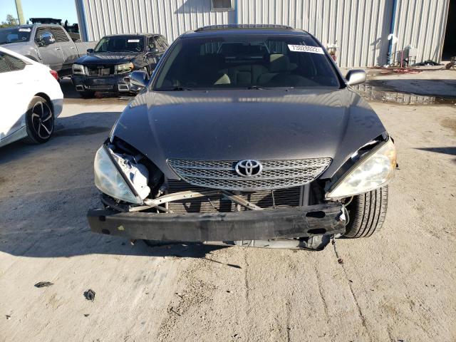 Photo 5 from auction – 2003 TOYOTA CAMRY LE with VIN 4T1BF30KX3U562507