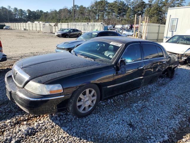 LINCOLN TOWN CAR E 2010 with VIN 2LNBL8EV7AX616828 - Photo from auction