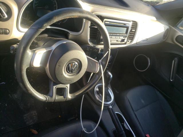 Photo 8 from auction – 2013 VOLKSWAGEN BEETLE with VIN 3VW5P7AT3DM800312