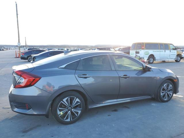 Photo 3 from auction – 2018 HONDA CIVIC EX with VIN JHMFC1F39JX042845