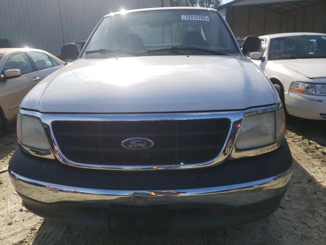 Foto 11 de la subasta – 2003 FORD F150 con VIN 1FTRX17203NA61548