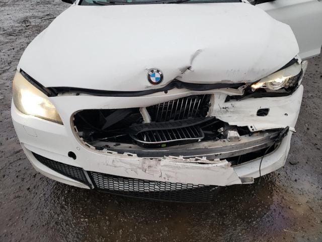 Photo 11 from auction – 2012 BMW 750 I with VIN WBAKA8C52CDS99724