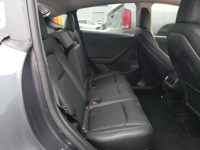 Photo 11 from auction – 2022 TESLA MODEL Y with VIN 7SAYGDEF7NF389556