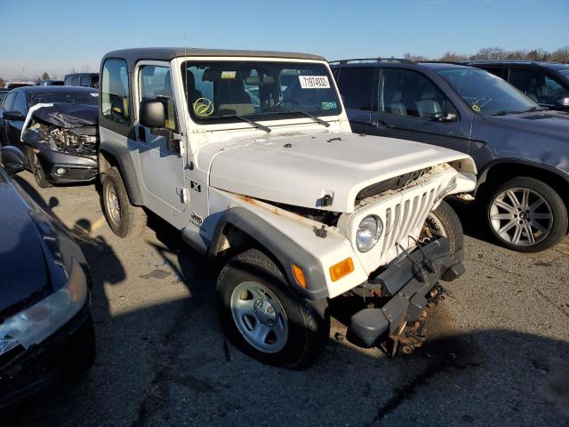 Photo 4 from auction – 2004 JEEP WRANGLER X with VIN 1J4FA39S14P737518